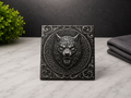 Celtic Wolf Relief Tile featuring fierce wolf head with Celtic knot border and baroque corners on dark stone finish